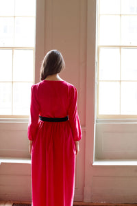 Fuchsia pink v neck ,long sleeve, corduroy dress.  Midi length 