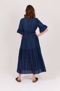 Navy Sustainable cotton Maxi dress, Three quarter sleeve, broderie anglaise,, waist sash. round neck. pull over head. Made in England  