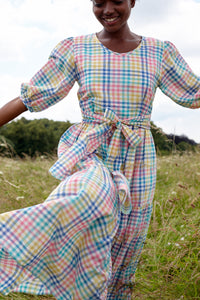 Cotton refresher check maxi dress. A softly tiered shape, with gentle tiers, a softly puffed (but not too puffy) sleeves, an optional sash and of course lovely deep pockets. Loose enough to go over the head, yet with enough shaping in the upper body for a flattering fit. 